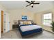 Bedroom features vaulted ceiling, ceiling fan, window, bed, and modern decor at 181 Tracy Ridge Blvd, Whiteland, IN 46184