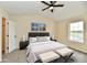 Bedroom features vaulted ceiling, ceiling fan, window, bed, and modern decor at 181 Tracy Ridge Blvd, Whiteland, IN 46184
