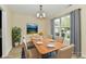 Beautiful dining room featuring a wooden table, six chairs, and natural light at 181 Tracy Ridge Blvd, Whiteland, IN 46184