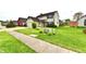 Charming two-story home with a well-manicured lawn and attached garage at 181 Tracy Ridge Blvd, Whiteland, IN 46184