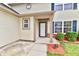 Charming front entrance with a covered porch and well-maintained landscaping adding curb appeal at 181 Tracy Ridge Blvd, Whiteland, IN 46184