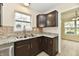 Traditional kitchen with stainless steel appliances and a window providing natural light at 181 Tracy Ridge Blvd, Whiteland, IN 46184
