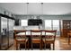 Modern kitchen with island, stainless steel appliances, and stylish pendant lighting at 1852 Singleton St, Indianapolis, IN 46203