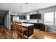 Contemporary kitchen featuring a center island, stainless appliances, and modern decor at 1852 Singleton St, Indianapolis, IN 46203