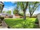 Expansive backyard with a storage shed, mature trees, and a well-maintained lawn, great for outdoor activities at 2307 Magnolia Pl, Indianapolis, IN 46219