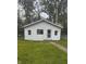 Outbuilding featuring white walls and green lawn at 2414 S Rybolt Ave, Indianapolis, IN 46241