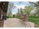 Backyard patio with a wrought iron table and chairs perfect for outdoor gatherings at 3003 Foxpointe Dr, Columbus, IN 47203
