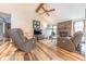 Inviting living room featuring a vaulted ceiling, wood beams, and a cozy fireplace at 3003 Foxpointe Dr, Columbus, IN 47203