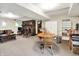 Spacious finished basement with a brick fireplace, comfortable seating, and ample room for dining or recreation at 3154 E German E Rd, Shelbyville, IN 46176