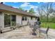 Backyard deck offers an inviting outdoor space for relaxation, featuring a grill and outdoor furniture at 3154 E German E Rd, Shelbyville, IN 46176