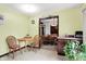 Charming dining area featuring wood chairs and a table set, open to a room with hardwood furnishings at 3154 E German E Rd, Shelbyville, IN 46176