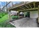 Exterior patio with sliding glass doors, creating a seamless transition to the backyard and outdoor living space at 3154 E German E Rd, Shelbyville, IN 46176