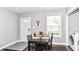 Bright dining area featuring a black table with seating for four and natural light at 319 S Randolph St, Indianapolis, IN 46201
