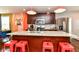 Well-lit kitchen with an island, stainless steel appliances, and modern fixtures at 319 S Randolph St, Indianapolis, IN 46201