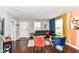 Stylish living room with modern décor, dark hardwood floors, and plenty of natural light at 319 S Randolph St, Indianapolis, IN 46201