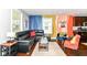 Beautiful hardwood flooring, colorful decorative walls and modern furniture in the living room at 319 S Randolph St, Indianapolis, IN 46201