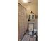 Well-lit bathroom with a combination cabinet over the toilet at 3348 W 800 N, Fairland, IN 46126