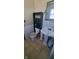 Comfortable bathroom with a pedestal sink, toilet, and black shelving unit at 3348 W 800 N, Fairland, IN 46126