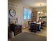 Cozy dining area showcasing rustic farmhouse decor and a table for six at 3348 W 800 N, Fairland, IN 46126