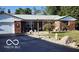 Charming single-story brick home with a well-maintained lawn and a white metal roof at 3348 W 800 N, Fairland, IN 46126