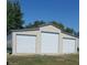 Spacious three car garage with a neutral color scheme and ample storage at 3348 W 800 N, Fairland, IN 46126