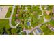 An aerial view showing property lines of a home with mature trees and a detached garage at 3405 W 8Th Street Rd, Anderson, IN 46011