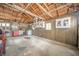 Spacious garage with ample storage, tools, and wall-mounted accessories at 3405 W 8Th Street Rd, Anderson, IN 46011