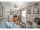 Cozy living room with decor, comfortable seating, and carpeted floors at 3405 W 8Th Street Rd, Anderson, IN 46011