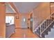 Inviting entryway featuring tile flooring and a staircase leading to the upper level at 3535 Ivory Way, Indianapolis, IN 46227
