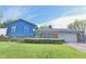 Charming two-story home featuring a well-maintained lawn and a spacious driveway at 3535 Ivory Way, Indianapolis, IN 46227