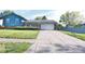Charming two-story home featuring a well-maintained lawn and a spacious driveway at 3535 Ivory Way, Indianapolis, IN 46227