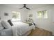Bedroom featuring a bed, wood flooring, natural light, and neutral décor at 3864 Esquire Ct, Indianapolis, IN 46226