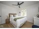 Bedroom with a full-sized bed, wood flooring, natural light, and ceiling fan at 3864 Esquire Ct, Indianapolis, IN 46226