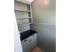 Butler's pantry featuring shelving, gray cabinets, and a countertop at 3864 Esquire Ct, Indianapolis, IN 46226