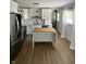 Beautifully renovated kitchen featuring stainless steel appliances and a functional island at 3864 Esquire Ct, Indianapolis, IN 46226
