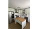Beautifully renovated kitchen featuring stainless steel appliances and a functional island at 3864 Esquire Ct, Indianapolis, IN 46226