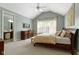 Comfortable bedroom with vaulted ceilings, a ceiling fan, and a relaxing atmosphere at 3965 Andretti Dr, Zionsville, IN 46077