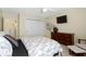 A bedroom with carpet flooring, a sliding door closet, and light yellow walls for a cozy feel at 3965 Andretti Dr, Zionsville, IN 46077