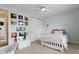 Bright bedroom with closet, white walls and a comfortable bed at 3965 Andretti Dr, Zionsville, IN 46077