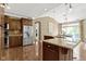 Kitchen featuring granite countertops, stainless steel appliances, and wooden cabinets at 3965 Andretti Dr, Zionsville, IN 46077