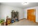 Cozy bedroom featuring carpeted floors, neutral walls and a light fixture at 4316 Moss Ridge Cir, Indianapolis, IN 46237
