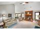 Inviting living room with a brick fireplace, comfortable seating, and an open layout perfect for entertaining at 4316 Moss Ridge Cir, Indianapolis, IN 46237