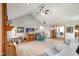 Cozy living room featuring a brick fireplace, plush seating, and an open floor plan, ideal for relaxation at 4316 Moss Ridge Cir, Indianapolis, IN 46237