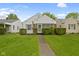 Charming home featuring lush green lawn, and decorative hedges enhance the curb appeal at 46 N Kitley Ave, Indianapolis, IN 46219