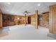Finished basement featuring wood walls, recessed lighting, and a staircase at 4840 N Templin Rd, Martinsville, IN 46151