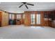 Finished basement featuring wood walls, recessed lighting, and sliding glass doors leading to the exterior at 4840 N Templin Rd, Martinsville, IN 46151