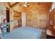 Inviting wood-paneled bedroom with carpet and closet space, creating a cozy and comfortable retreat at 4840 N Templin Rd, Martinsville, IN 46151