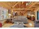 Spacious living area featuring wooden accents, stairs, high ceilings, and a comfortable seating area at 4840 N Templin Rd, Martinsville, IN 46151