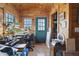 This studio boasts wood walls, lots of natural light, and a door leading to the exterior at 4840 N Templin Rd, Martinsville, IN 46151