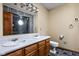 Bathroom with double sink vanity, tile floor, and oversized mirror at 504 Countryside Dr, Lebanon, IN 46052